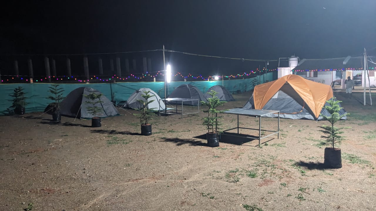 Affordable 1-night camping tent stay for two people, including tent, bedding, and campsite access in Araku Valley.